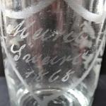 Glass with name and dated 1868