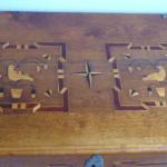 Burghers chest with inlaid doves and stars