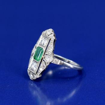 Platinum art deco ring with emerald