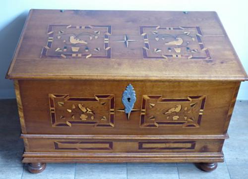 Burghers chest with inlaid doves and stars