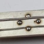 Gilded silver brooch with three rhinestones Gilded silver brooch with three rhinestones