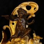 Cartel clock with angel Cartel clock with angel