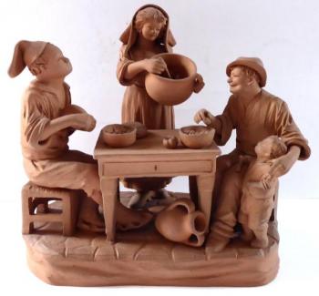 Family at the dinner table - Grasso, Italy Family at the dinner table - Grasso, Italy