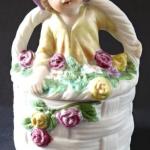 Box, basket, with roses and statuette Box, basket, with roses and statuette