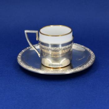Silver cup with saucer Silver cup with saucer