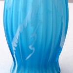 Light blue and white vase, with flutes Light blue and white vase, with flutes