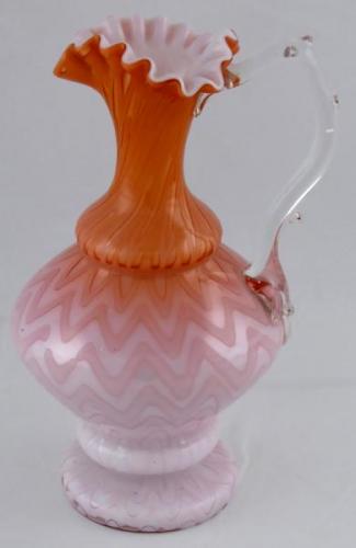 Pitcher made of milk, pink and orange glass Pitcher made of milk, pink and orange glass