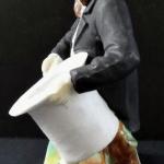 Man with beard, in frak, with white hat Man with beard, in frak, with white hat