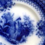 Blue stoneware plate with a peacock -Sarreguemines Blue stoneware plate with a peacock -Sarreguemines