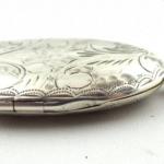 Silver engraved oval medallion Silver engraved oval medallion