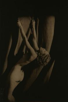 A nude female holding to a curtain A nude female holding to a curtain