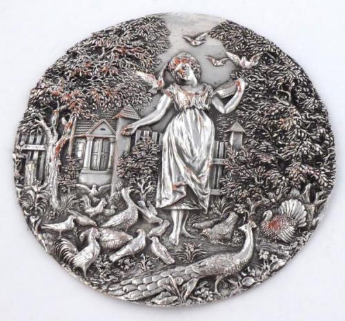 Girl with birds in the garden Girl with birds in the garden