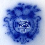 Blue stoneware plate with a peacock -Sarreguemines Blue stoneware plate with a peacock -Sarreguemines