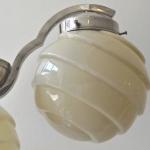 Chandelier made of white metal, with shaped balls Chandelier made of white metal, with shaped balls