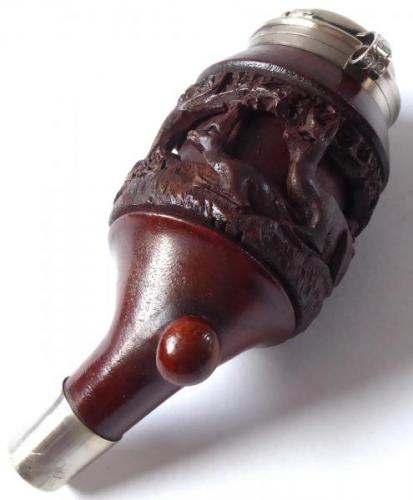 Pipe with carved deer and rope motif Pipe with carved deer and rope motif