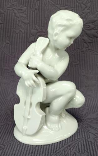 Porcelain Boy Figurine - 1920 Porcelain Boy Figurine - 1920