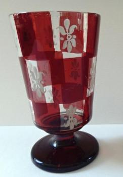 Glass on the stem with white lilies Glass on the stem with white lilies