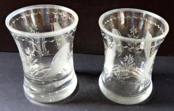 Two smaller glasses, cut floral motif Two smaller glasses, cut floral motif