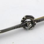 Brooch with horseshoe, white and yellow metal Brooch with horseshoe, white and yellow metal