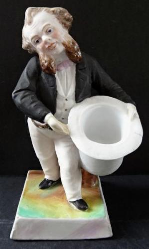 Man with beard, in frak, with white hat Man with beard, in frak, with white hat