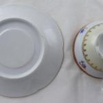 Coffee cup with pink top line and gilded ornament Coffee cup with pink top line and gilded ornament