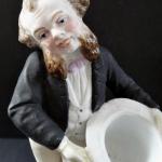 Man with beard, in frak, with white hat Man with beard, in frak, with white hat