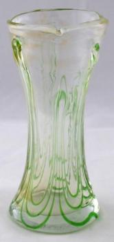 Vase wrapped with glass uranium threads Vase wrapped with glass uranium threads