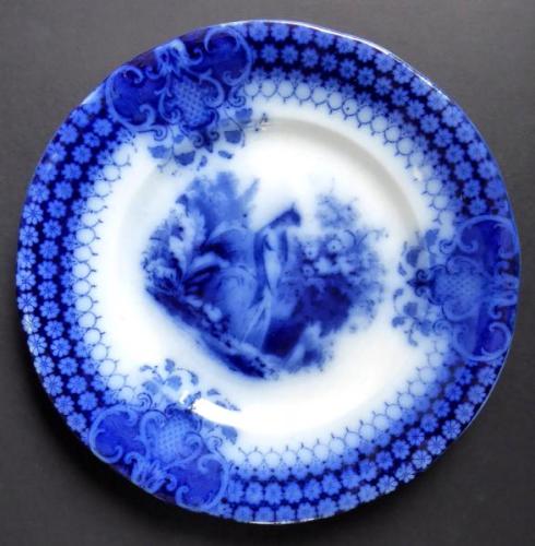 Blue stoneware plate with a peacock -Sarreguemines Blue stoneware plate with a peacock -Sarreguemines