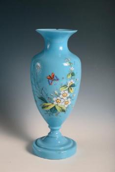 A painted vase of turquiose glass A painted vase of turquiose glass