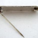 Silver brooch with red flowers and coloured enamel Silver brooch with red flowers and coloured enamel