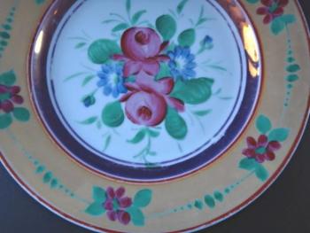 Plate with roses and ocher trim Plate with roses and ocher trim