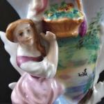 Vase with a figure of a girl and a basket Vase with a figure of a girl and a basket