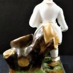 Figurine Chinese boy with a ball - stand Figurine Chinese boy with a ball - stand