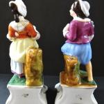 Figural pair of boy and girl on a pedestal Figural pair of boy and girl on a pedestal