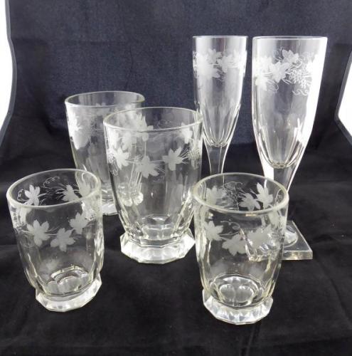 Paired glasses with vine stems Paired glasses with vine stems