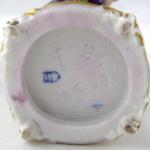 Boy tuning a violin - Passau, Germany Boy tuning a violin - Passau, Germany