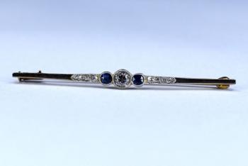 Gold brooch with diamonds and sapphires Gold brooch with diamonds and sapphires
