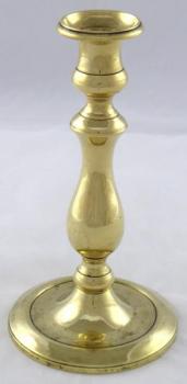 Brass candlestick in the shape of a column Brass candlestick in the shape of a column