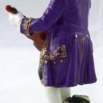 Boy tuning a violin - Passau, Germany Boy tuning a violin - Passau, Germany