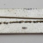 Silver brooch with red flowers and coloured enamel Silver brooch with red flowers and coloured enamel