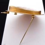 Gold brooch and hinge, with a large cameo Gold brooch and hinge, with a large cameo