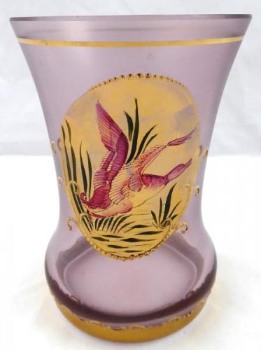 Glass with gold medallion and duck Glass with gold medallion and duck