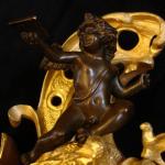 Cartel clock with angel Cartel clock with angel