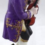 Boy tuning a violin - Passau, Germany Boy tuning a violin - Passau, Germany