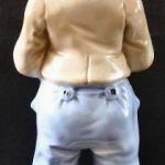 Statue of a man with his head at his feet Statue of a man with his head at his feet