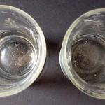 Two smaller glasses, cut floral motif Two smaller glasses, cut floral motif