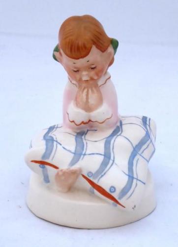 Little girl in nightgown and pillow - Royal Dux Little girl in nightgown and pillow - Royal Dux