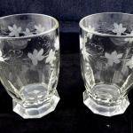Paired glasses with vine stems Paired glasses with vine stems