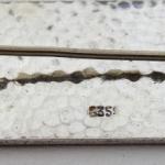 Silver brooch with red flowers and coloured enamel Silver brooch with red flowers and coloured enamel