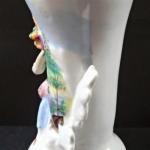 Vase with a figure of a girl and a basket Vase with a figure of a girl and a basket